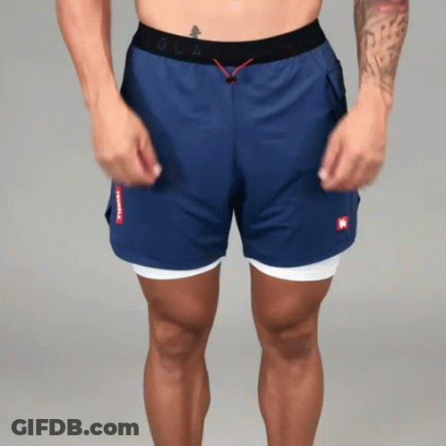 Shirtless Man In Blue Shorts With Red K GIF