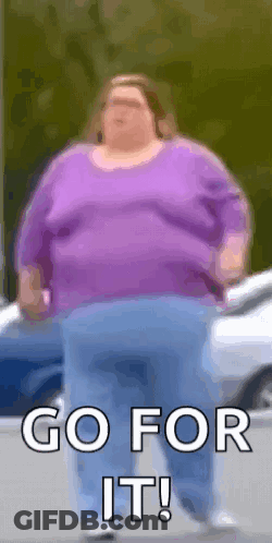 Shirtless Man In Blue Trunks Jumping Into Ocean GIF