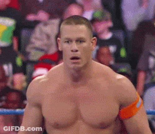 Shirtless Man In Boxing Ring With Crowd GIF