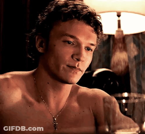 Shirtless Man In Cross Necklace Looking GIF