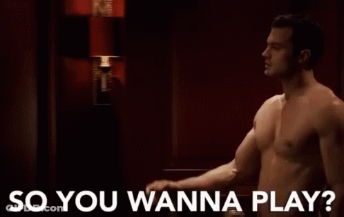 Shirtless Man In Dark Room Saying So You Wanna Play GIF