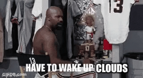 Shirtless Man In Director Chair In Locker Room GIF