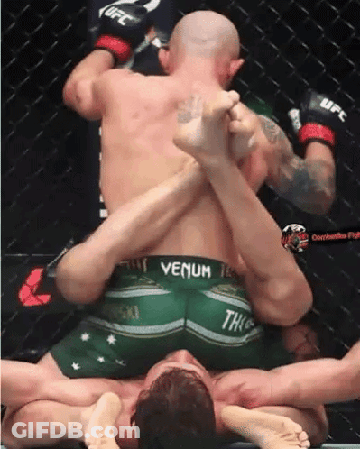 Shirtless Man In Front Of Bodyarmor Sign GIF
