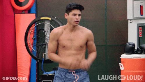 Shirtless Man In Front Of Ice Machine And Fan GIF