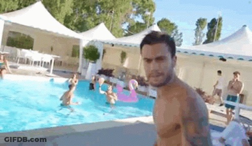 Shirtless Man In Front Of Pool GIF