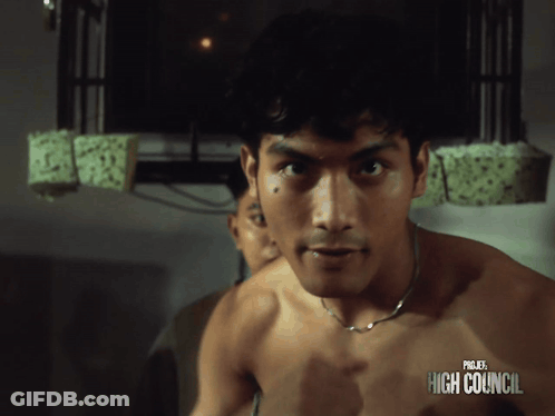 Shirtless Man In Front Of Project High Council Ad GIF