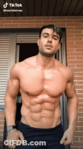 Shirtless Man In Front Of Wooden Lockers Number 105 GIF