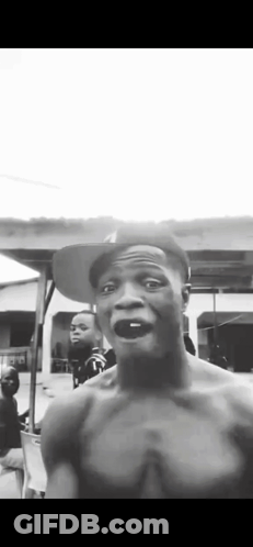 Shirtless Man In Hat Making Funny Face GIF