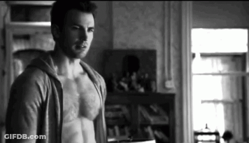 Shirtless Man In Hoodie Standing GIF