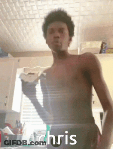 Shirtless Man In Kitchen With Chris Written Below GIF