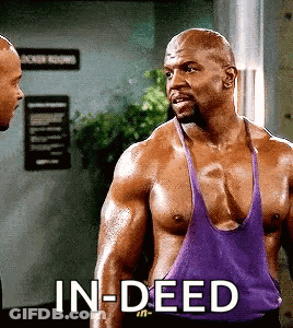 Shirtless Man In Purple Tank Top Talking To Another GIF