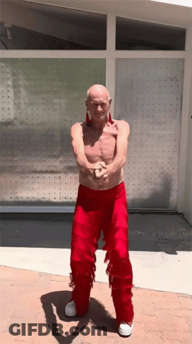 Shirtless Man In Red Pants With Fringe GIF