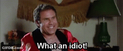 Shirtless Man In Red Robe Smiling Saying What An Idiot GIF