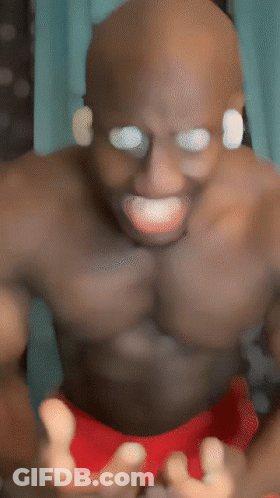 Shirtless Man In Red Shorts GIF