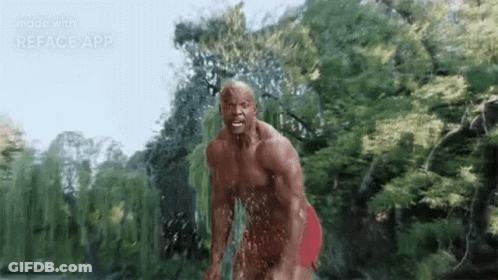 Shirtless Man In Red Underwear Splashing Water In Pond GIF