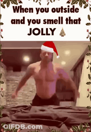 Shirtless Man In Santa Hat GIF