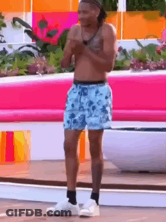 Shirtless Man In Shorts At Pink Bench GIF