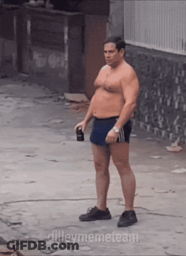 Shirtless Man In Shorts On Sidewalk With Dileymemeteam GIF