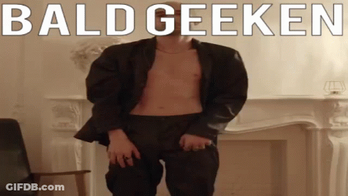 Shirtless Man In Suit Dancing Fireplace Bald Geeken GIF