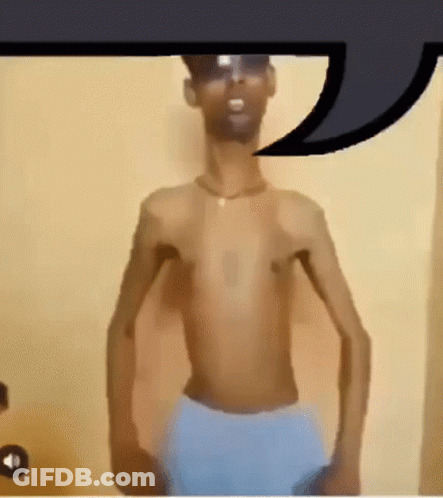 Shirtless Man In Sunglasses And Blue Shorts GIF