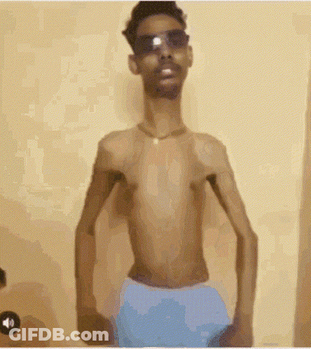Shirtless Man In Sunglasses And Blue Shorts GIF