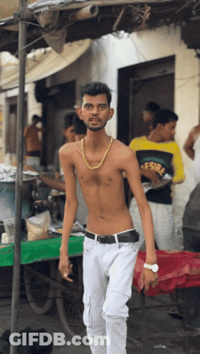 Shirtless Man In White Pants And Gold Chain GIF