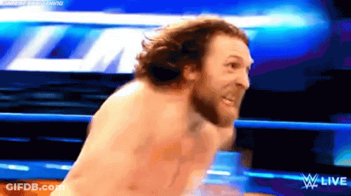 Shirtless Man In Wrestling Ring With W Live Logo GIF