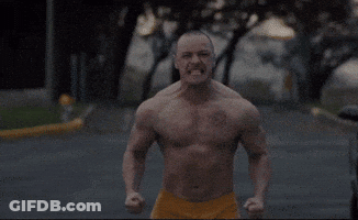 Shirtless Man In Yellow Shorts Running GIF