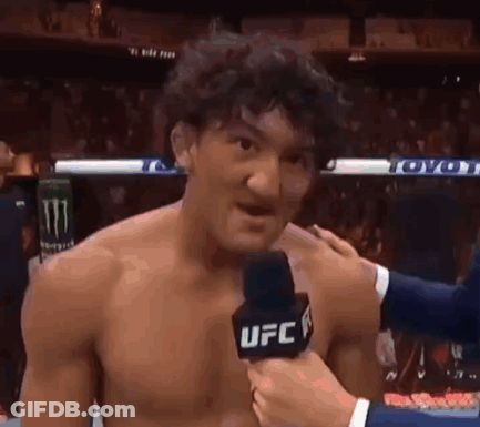 Shirtless Man Interviewed By UFC Reporter In Boxing Ring GIF