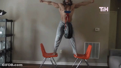 Shirtless Man Jumping Holding Tire With TH GIF