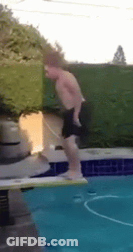 Shirtless Man Jumping Into Pool GIF
