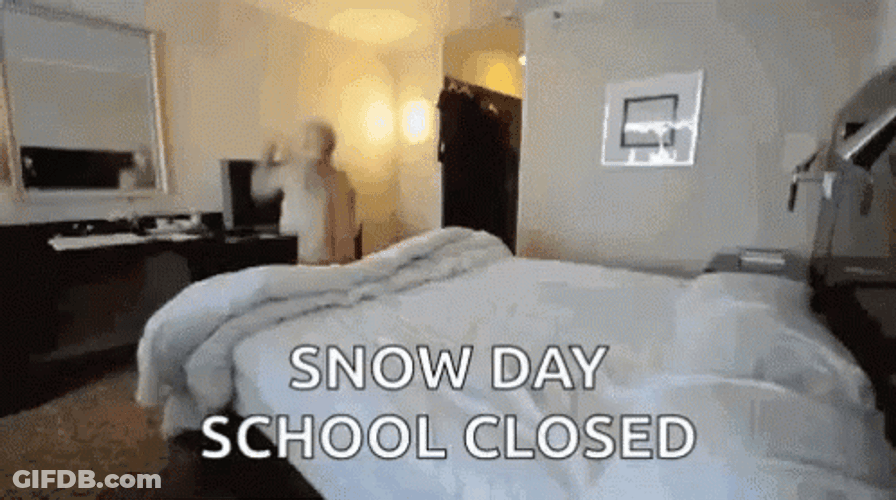 Shirtless Man Jumping On Bed Enjoying Snow Day GIF