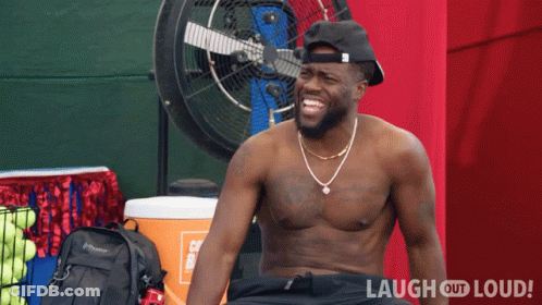 Shirtless Man Laughing In Front Of Fan Laugh Out Loud Logo GIF