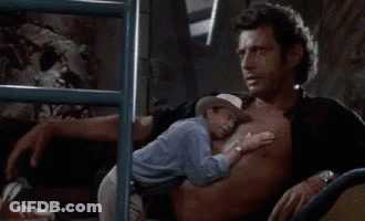 Shirtless Man Laying Down With Child On Chest GIF