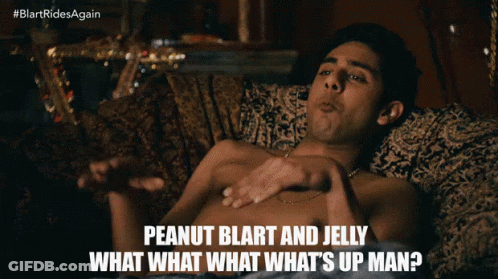 Shirtless Man Laying On Couch Talking About Peanut Blart And Jelly GIF