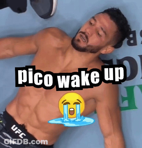 Shirtless Man Laying On Ground With Pico Wake Up GIF