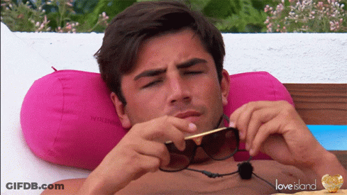 Shirtless Man Laying On Pink Pillow Love Island GIF