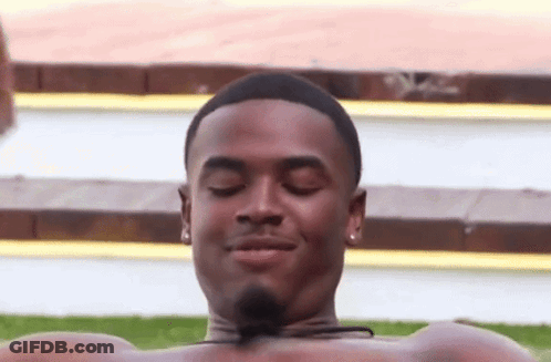 Shirtless Man Lying In Pool Eyes Closed Smiling GIF