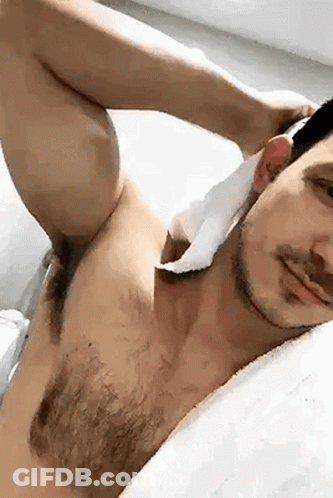 Shirtless Man Lying On Bed GIF