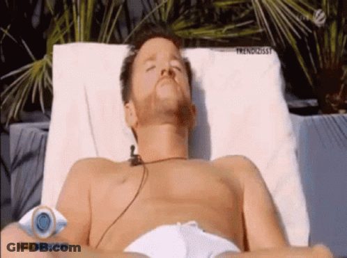 Shirtless Man Lying On Chair GIF