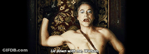 Shirtless Man Lying On Rug Saying Lie Down With Me Watson GIF
