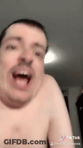 Shirtless Man Making Funny Face With Mouth Open GIF