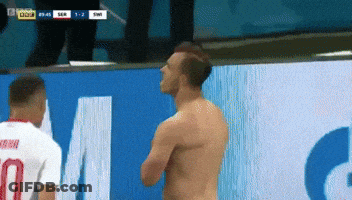 Shirtless Man Next To Man With Number 7 GIF