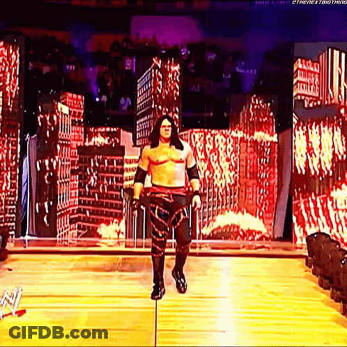 Shirtless Man On Pole In Front Of City GIF