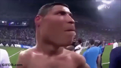 Shirtless Man On Soccer Field Surrounded By People GIF