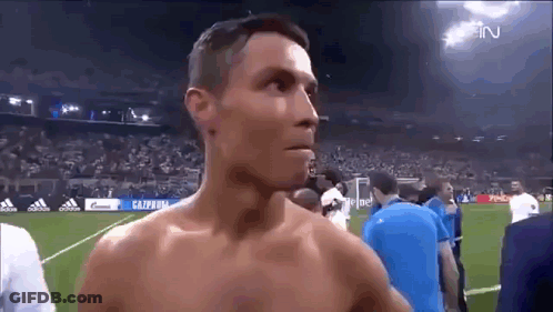 Shirtless Man On Soccer Field With Crowd GIF