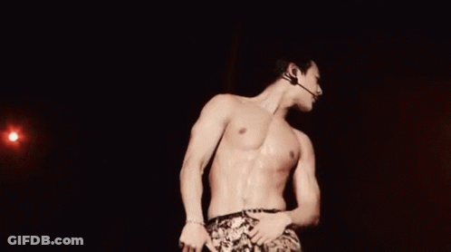 Shirtless Man On Stage With Microphone GIF