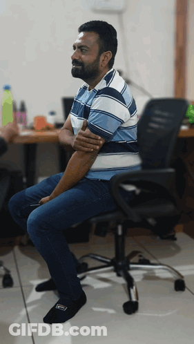 Shirtless Man Pointing At Camera In Front Of Crowd GIF