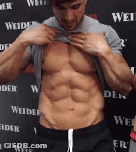 Shirtless Man Revealing Muscles GIF