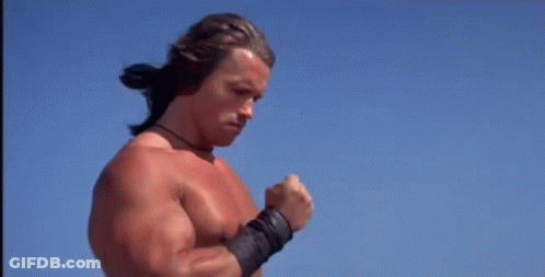 Shirtless Man Running In Front Of Gallery Entrance Sign GIF